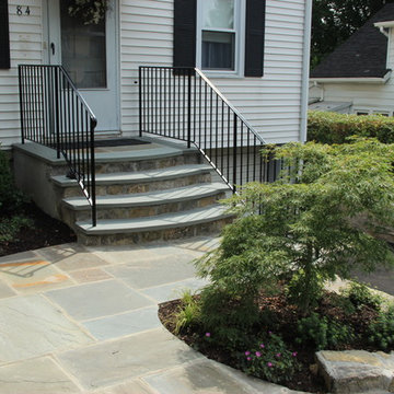 Landscape, retaining wall, steps and driveway