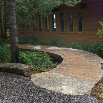 Mississauga Lake, deck with natural stone accents through trees