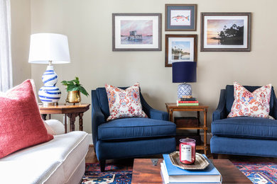 Inspiration for a mid-sized transitional open concept medium tone wood floor and brown floor family room remodel in Charlotte with green walls, a standard fireplace and a wall-mounted tv