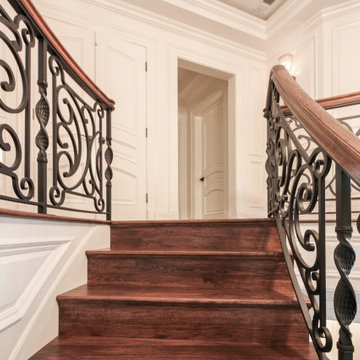 Project #74 | Circular Staircase with Hand-Forged Metal Panels