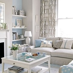 Need to decorate a living room with a light blue carpet