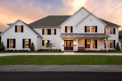Example of a transitional exterior home design in Dallas