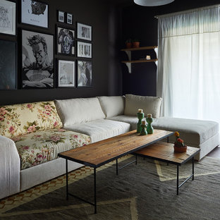 Idee per un piccolo soggiorno minimalista chiuso con pareti nere e nessuna TV