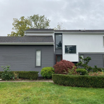 Modern Exterior Renovation with Vinyl Siding & Trim in Commerce Michigan