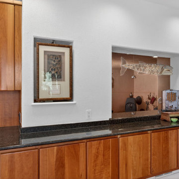 Luxury Mid-Century Kitchen with Custom Wood Cabinetry and Stone Countertops