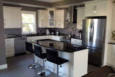 Example of a minimalist kitchen design in Vancouver