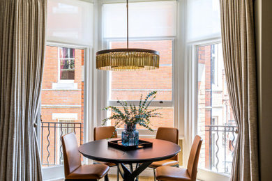 Photo of a contemporary dining room in London.