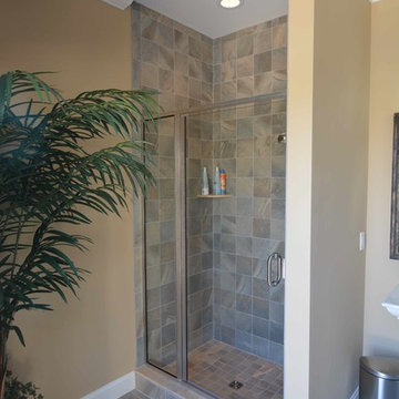 Custom Freeform style salt water in ground pool with Pool House and Raised Spa
