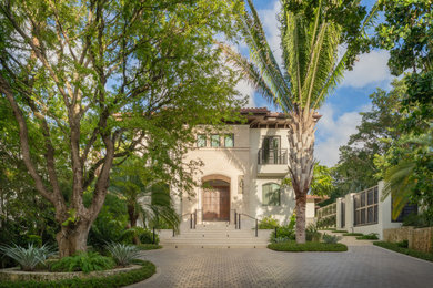 Example of a beach style house exterior design in Miami