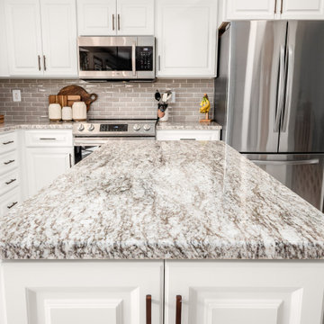 Transitional Kitchen Remodel Done in a White Satin Breckenridge Door
