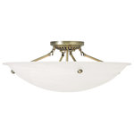 Livex Lighting - Oasis Ceiling Mount, Antique Brass - This ceiling mount features contour lines and a bowed profile. With an understated design, this piece is perfect for any space in your home. Featuring a white alabaster glass and antique brass finish, this fixture will effortlessly blend with your existing d�cor.