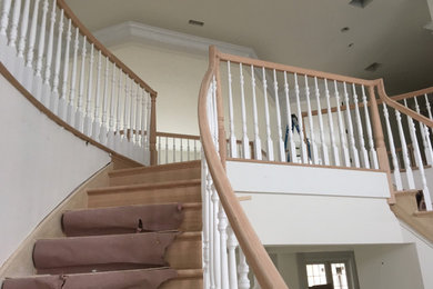 Staircase - large shabby-chic style wooden wood railing staircase idea in Philadelphia with wooden risers