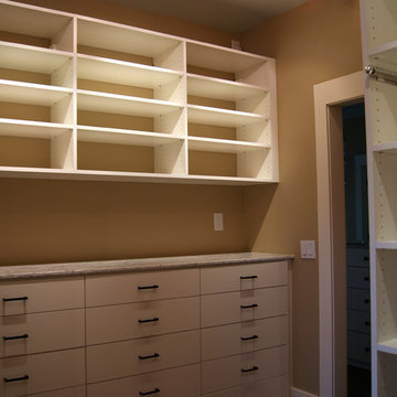 Elegant His & Her Closets | SpaceManager Closets
