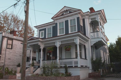 Mid-sized victorian blue two-story wood exterior home idea in Charleston