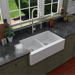 Karran USA - Karran Farmhouse Apron Front Quartz 34" Double Bowl Kitchen Sink, White - This elegant farmhouse design with its deep 9-1/4" apron blends function and form beautifully, and will look stunning in your new kitchen. It is manufactured from an extremely durable quartz composite material that will provide decades of trouble-free use. This farmhouse design is available in a choice of 6 elegant color choices to compliment any decor.