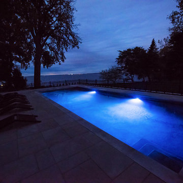 Contemporary pool and backyard in Pointe-Claire