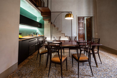 Idee per una sala da pranzo aperta verso la cucina design di medie dimensioni con soffitto a volta