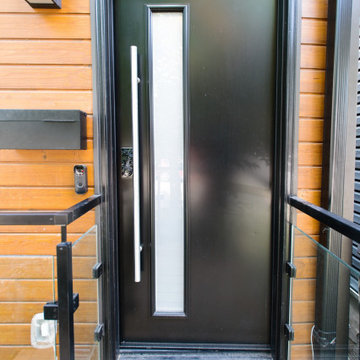 Black Front Door with Frosted Glass and Modern Wall Light | East York