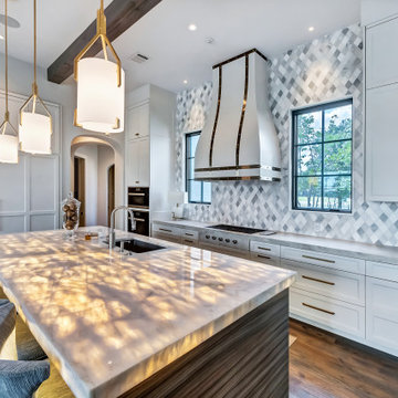 White transitional kitchen with backlit island