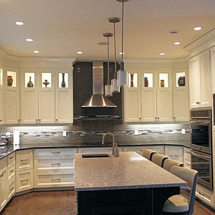 Mid-sized modern kitchen pantry remodeling - Mid-sized minimalist u-shaped kitchen pantry photo in Other with an undermount sink, shaker cabinets, white cabinets, quartz countertops, metallic backsplash, matchstick tile backsplash, stainless steel appliances and an island