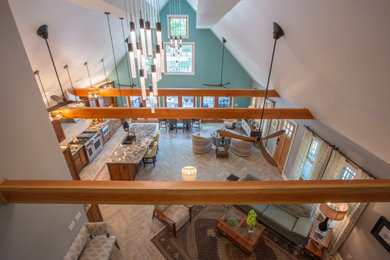 Living room - 1960s open concept ceramic tile, vaulted ceiling and brown floor living room idea in Kansas City