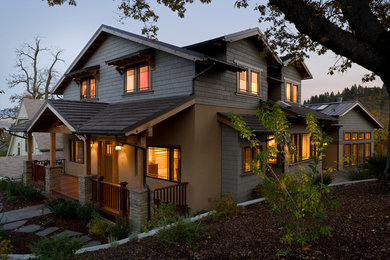 This is an example of a large arts and crafts home design in Portland.