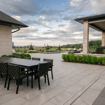 Contemporary Outdoor Pool and Covered Patio Using Porcea Creek Porcelain Pavers