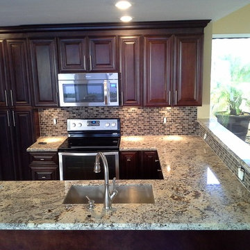 Alaskan White Granite paired with Mocha Cabinetry