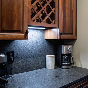 Reconfigured kitchen with new islands, countertops, backsplash
