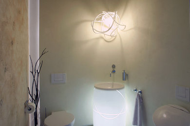 Photo of a contemporary powder room in Other.