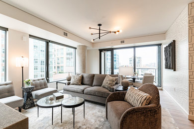 Mid-sized trendy enclosed vinyl floor, brown floor and wallpaper living room photo in Denver with multicolored walls
