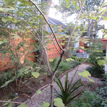 A wrap around garden with fabulous water features!