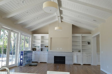 Example of a family room design in Other