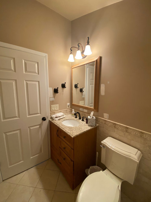 ideas to spruce up bathroom on a budget?