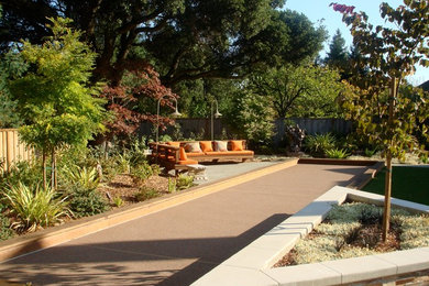 Photo of a huge modern full sun backyard outdoor basketball/tennis/multi-game court in San Francisco with decking for summer.