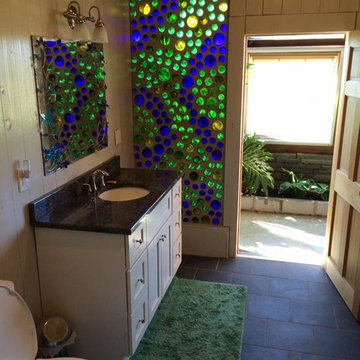 Bathroom with Bottle Wall