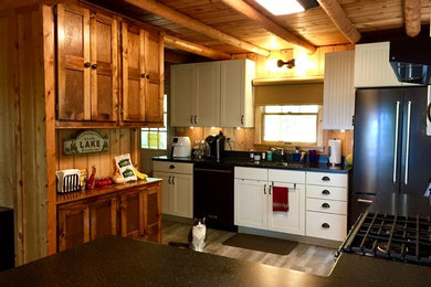 Example of a country kitchen design in Other