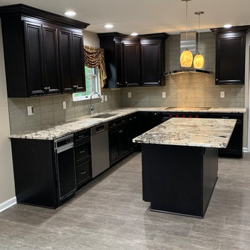 kitchen remodel----espresso with granite and glass splash new flooring