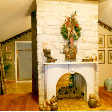 Antique Marble fireplace mantle with cut stone surround set in Master Bed Room