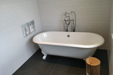 Large cottage master white tile and ceramic tile porcelain tile bathroom photo in Vancouver with an integrated sink, open cabinets, white cabinets, marble countertops, a two-piece toilet and white walls