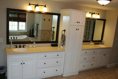 Large elegant master beige tile ceramic tile bathroom photo in Other with raised-panel cabinets, white cabinets, beige walls and an undermount sink
