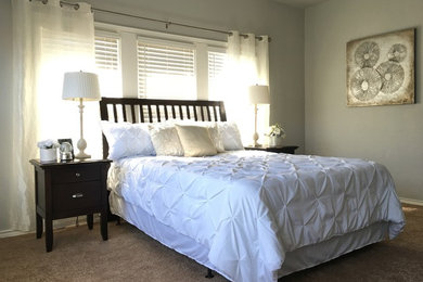 Inspiration for a mid-sized contemporary master carpeted bedroom remodel in Dallas with gray walls