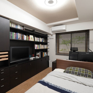 壁面収納とL型デスクで作るエグゼクティブな書斎兼寝室