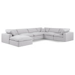 Meridian Furniture - Comfy Upholstered U-Shaped Modular Sectional, White, 7-Piece: 3 Armless Chair, 3 Corner Chair, 1 Ottoman, Linen Textured Fabric - Give your space a whole new look with this white Comfy linen textured fabric sectional. This handsome sectional fits nicely with other items in the Comfy collection and is a versatile seating option designed for adaptability, comfort and style. Wrapped in rich white durable linen textured fabric upholstery, this sectional offers a plush embrace of overstuffed down feather cushions, carefully crafted to deliver the highest level of comfort. The perfect seat for creating an oasis for relaxation, this sectional has thick foam surrounding its frame for added support and coziness.