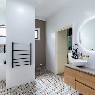 Design ideas for a contemporary bathroom in Adelaide with flat-panel cabinets, medium wood cabinets, a curbless shower, white tile, a vessel sink, multi-coloured floor, grey benchtops, a niche, a shower seat, a single vanity and a floating vanity.