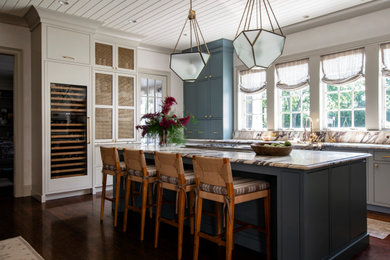 Eat-in kitchen - large eclectic u-shaped dark wood floor, brown floor and shiplap ceiling eat-in kitchen idea in Nashville with an integrated sink, beaded inset cabinets, beige cabinets, marble countertops, multicolored backsplash, marble backsplash, paneled appliances, an island and multicolored countertops