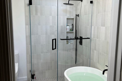 Inspiration for a mid-sized modern master bathroom remodel in San Francisco with a hinged shower door