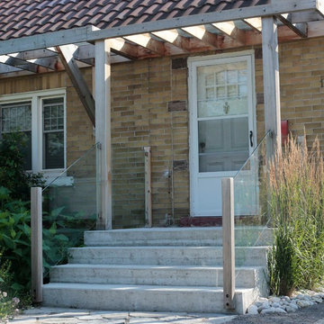 Front Entry with Pergola and Glass Railing