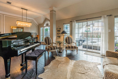 Large elegant open concept dark wood floor and brown floor living room photo in Other with a music area, beige walls, no fireplace and no tv