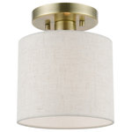 Livex Lighting - Blossom 1 Light Antique Brass Petite Semi-Flush - The Meadow collection is both modern and versatile. The hand-crafted fabric oatmeal colored hardback shade is set off by the silky white fabric on the inside setting a pleasant mood. The petite size single-light drum shade adds character to this handsomely styled semi flush.  Perfect fit for the hallway, bathroom, kitchen and a small bedroom. This sleek design is shown in an antique brass finish.